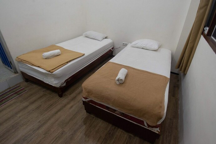 Imagen de la habitación del Hotel Simpang 7 Residence. Foto 20