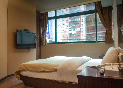 Imagen de la habitación del Hotel Simply Life. Foto 8