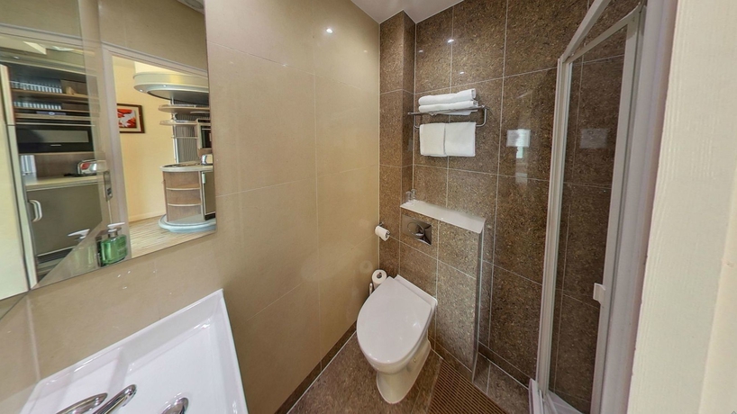 Imagen de la habitación del Hotel Simply Rooms and Suites. Foto 7