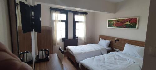 Imagen de la habitación del Hotel Simre. Foto 18