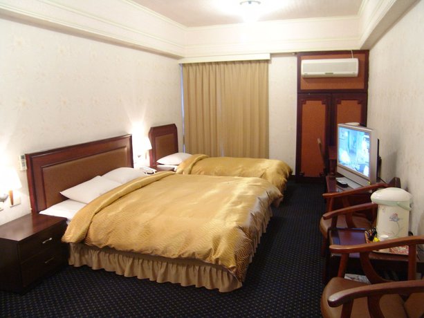 Imagen de la habitación del Hotel Sin Fu Business. Foto 9