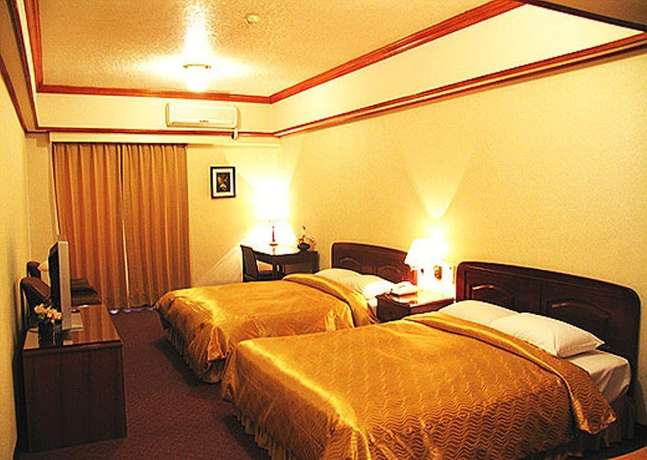 Imagen de la habitación del Hotel Sin Fu Business. Foto 12