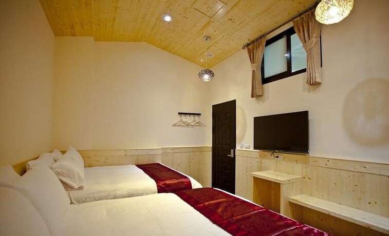 Imagen de la habitación del Hotel Sin Ging Hong Resort. Foto 14