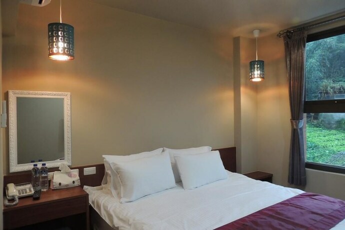 Imagen de la habitación del Hotel Sin Ging Hong Resort. Foto 32
