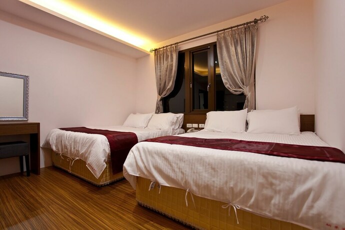Imagen de la habitación del Hotel Sin Ging Hong Resort. Foto 34