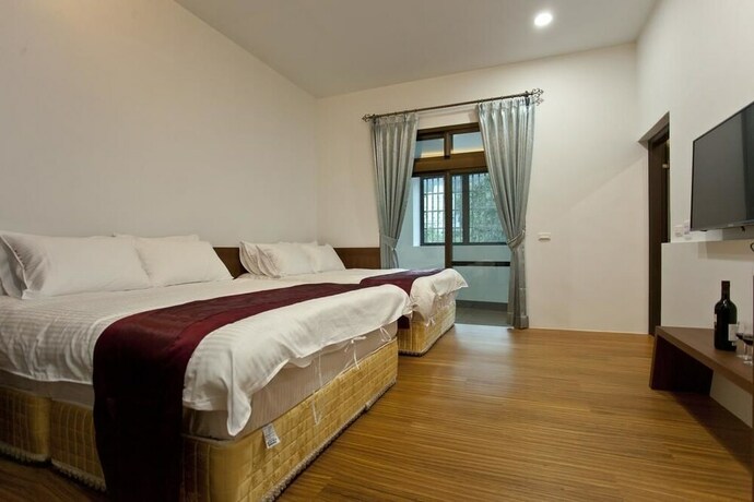 Imagen de la habitación del Hotel Sin Ging Hong Resort. Foto 35
