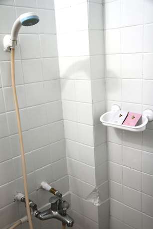 Imagen de la habitación del Hotel Sin Wu Fu. Foto 8