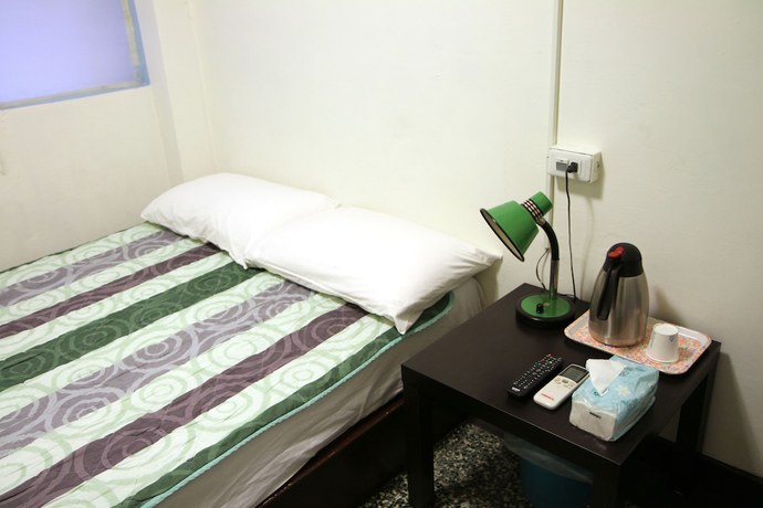 Imagen de la habitación del Hotel Sin Wu Fu. Foto 9