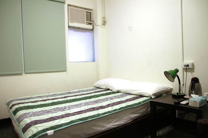 Imagen de la habitación del Hotel Sin Wu Fu. Foto 10