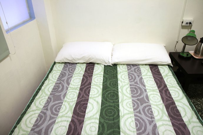 Imagen de la habitación del Hotel Sin Wu Fu. Foto 14