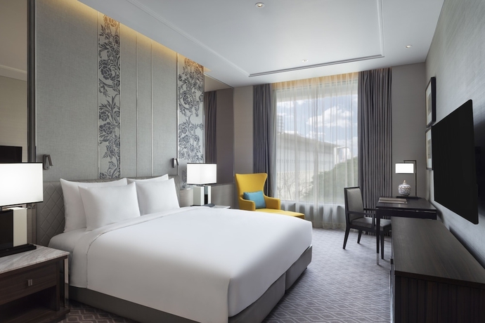 Imagen de la habitación del Hotel Sindhorn Kempinski Bangkok. Foto 17