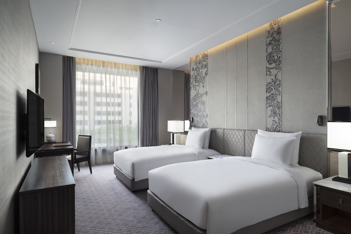 Imagen de la habitación del Hotel Sindhorn Kempinski Bangkok. Foto 18