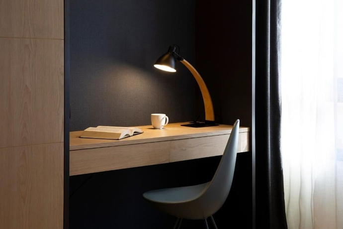 Imagen de la habitación del Hotel Sindhorn Midtown. Foto 11