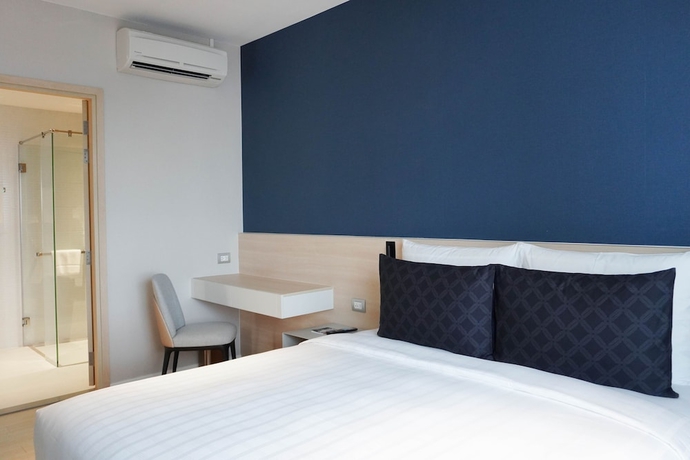 Imagen de la habitación del Hotel Sindhorn Midtown. Foto 15