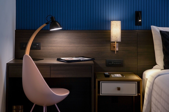 Imagen de la habitación del Hotel Sindhorn Midtown. Foto 19