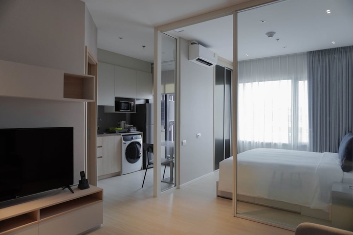 Imagen de la habitación del Hotel Sindhorn Midtown, Vignette Collection by IHG. Foto 3