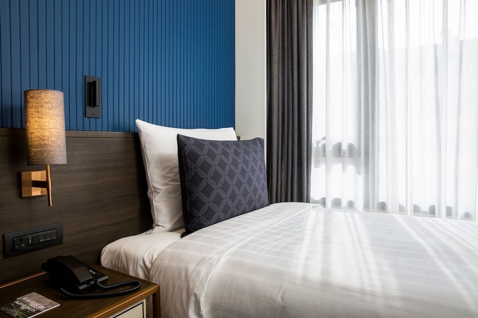 Imagen de la habitación del Hotel Sindhorn Midtown, Vignette Collection by IHG. Foto 16