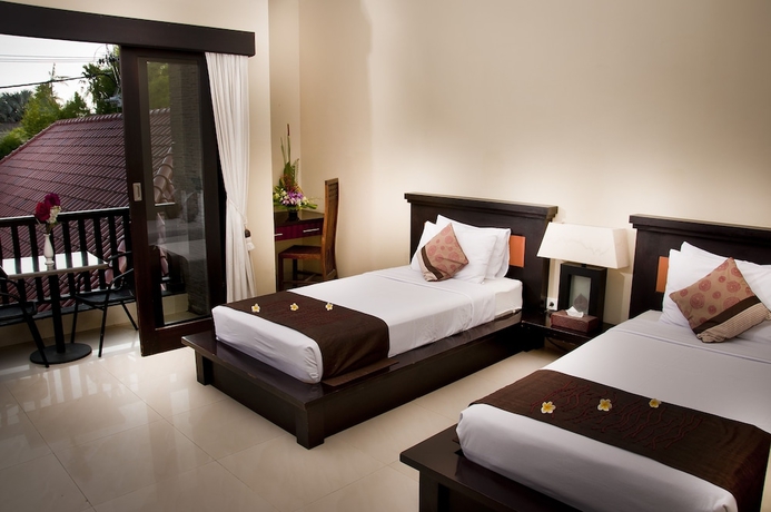 Imagen de la habitación del Hotel Sindhu Mertha Suite. Foto 8