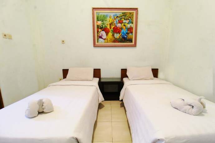 Imagen de la habitación del Hotel Sinergi Tretes. Foto 16