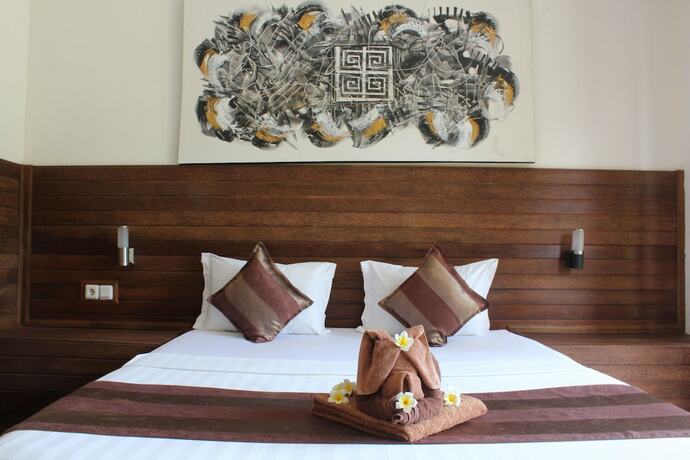 Imagen de la habitación del Hotel Singabu Bungalows. Foto 18