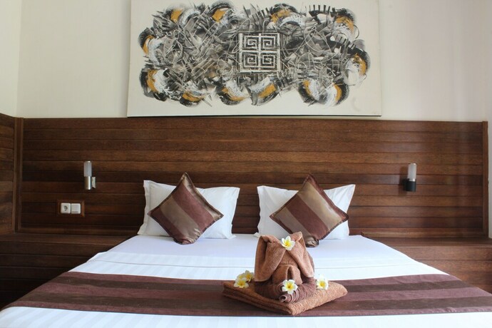 Imagen de la habitación del Hotel Singabu Bungalows. Foto 19