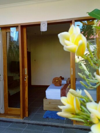 Imagen de la habitación del Hotel Singabu Bungalows. Foto 22