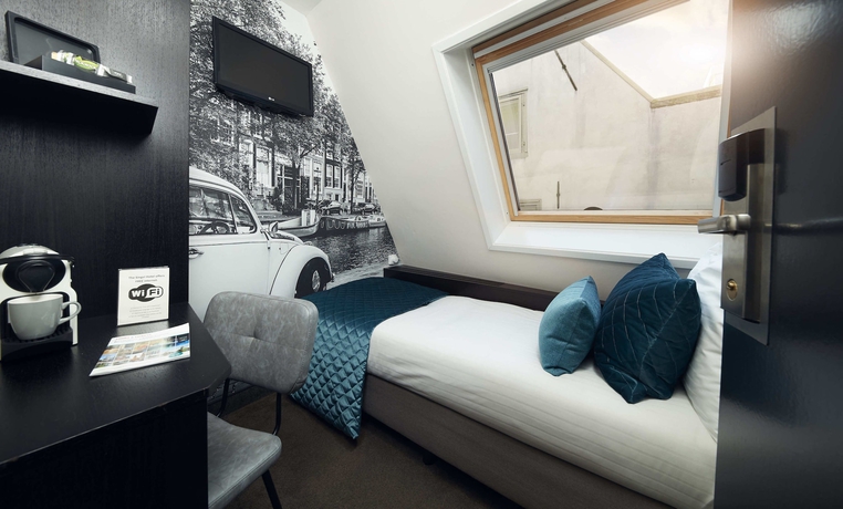 Imagen de la habitación del Hotel Singel Amsterdam. Foto 15