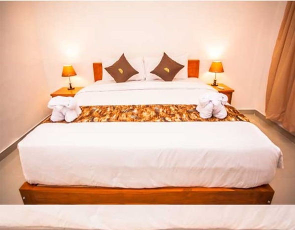 Imagen de la habitación del Hotel Singgahan Bungalow. Foto 24