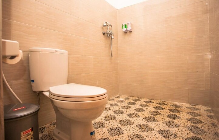 Imagen de la habitación del Hotel Singgahan Bungalow. Foto 25