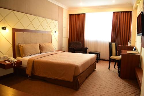 Imagen de la habitación del Hotel Singgasana Makassar. Foto 2