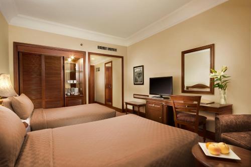 Imagen de la habitación del Hotel Singgasana Makassar. Foto 3