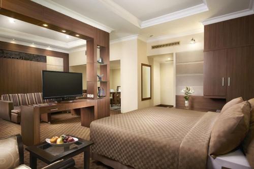 Imagen de la habitación del Hotel Singgasana Makassar. Foto 4