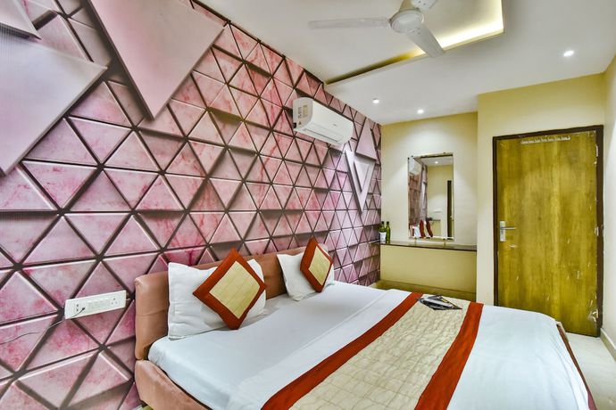 Imagen de la habitación del Hotel Singh International. Foto 10