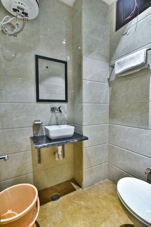 Imagen de la habitación del Hotel Singh International. Foto 11