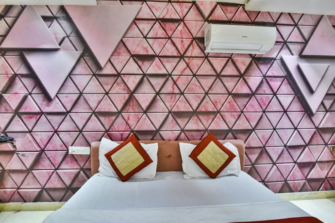 Imagen de la habitación del Hotel Singh International. Foto 12