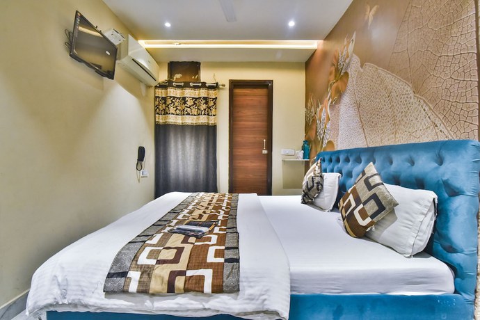 Imagen de la habitación del Hotel Singh International. Foto 18