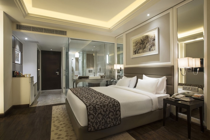 Imagen de la habitación del Hotel Singhania Sarovar Portico. Foto 12