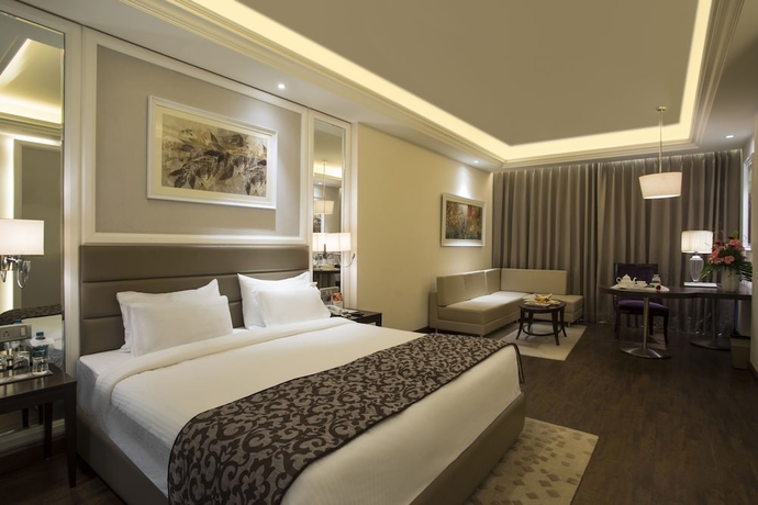 Imagen de la habitación del Hotel Singhania Sarovar Portico. Foto 14