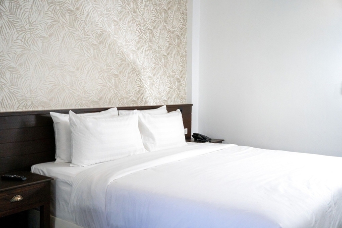 Imagen de la habitación del Hotel Singharaj Boutique. Foto 13