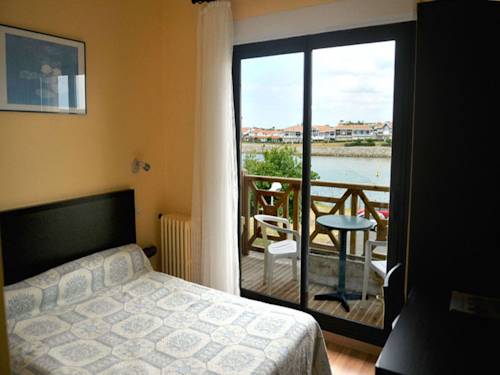 Imagen de la habitación del Hotel Single Fin & Lodge. Foto 14