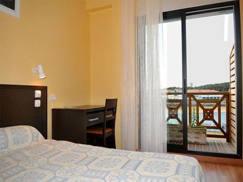 Imagen de la habitación del Hotel Single Fin & Lodge. Foto 15