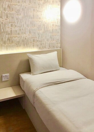 Imagen de la habitación del Hotel Single Inn - Taipei. Foto 24