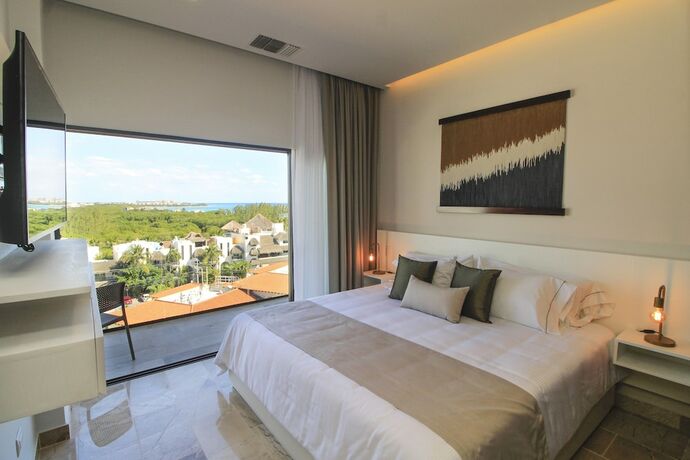 Imagen de la habitación del Hotel Singular Dream Vacation Rentals. Foto 16