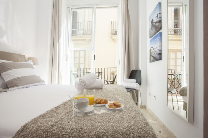 Imagen de la habitación del Hotel Singularstays Mercado Central. Foto 11