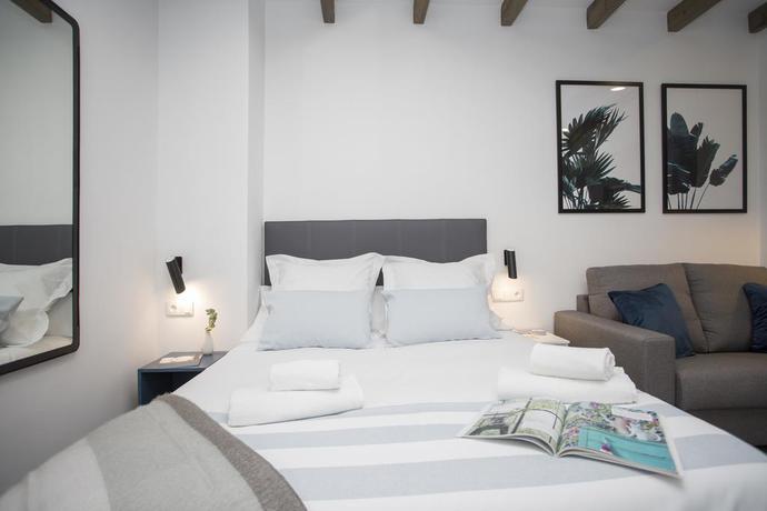 Imagen de la habitación del Hotel Singularstays Parque Central. Foto 3