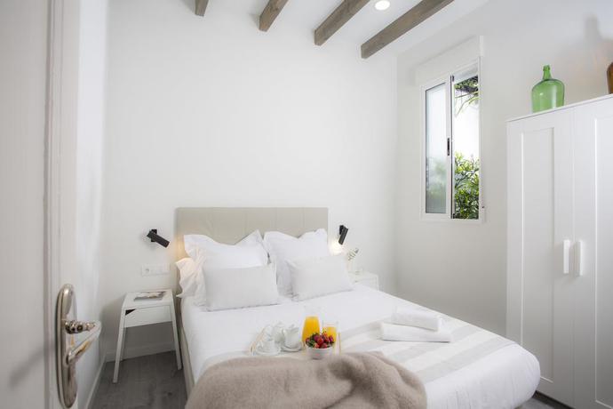 Imagen de la habitación del Hotel Singularstays Parque Central. Foto 6