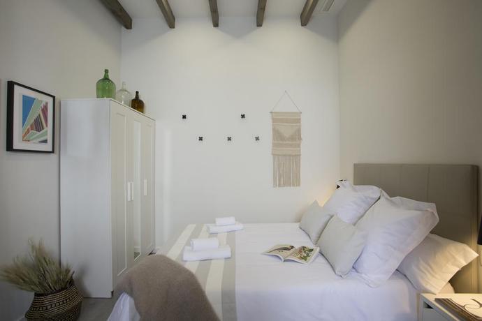 Imagen de la habitación del Hotel Singularstays Parque Central. Foto 11