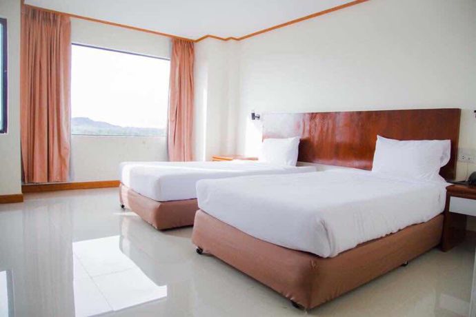 Imagen de la habitación del Hotel Sinkiat Thani. Foto 9