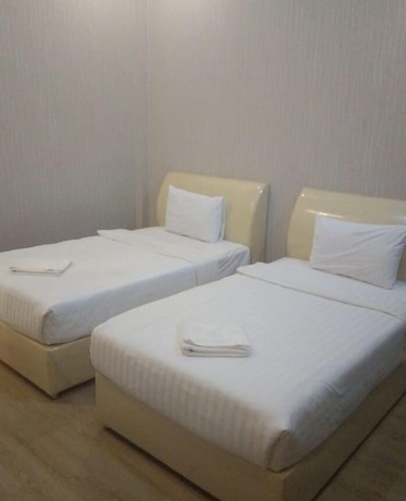 Imagen de la habitación del Hotel Sinnakhone. Foto 18