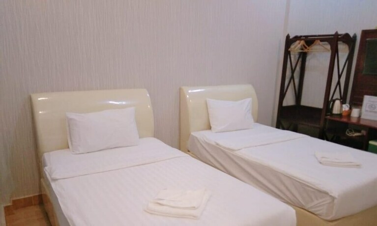 Imagen de la habitación del Hotel Sinnakhone. Foto 20